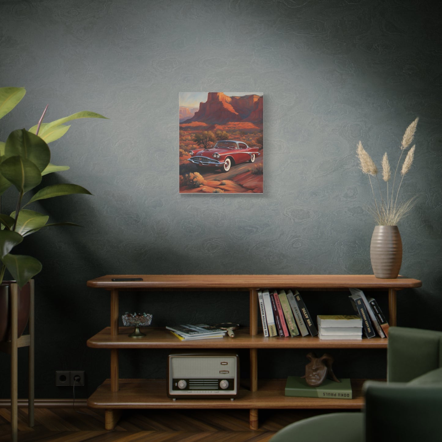 Vintage Red Car Matte Canvas Wall Art displayed on a living room wall above a wooden shelf with plants