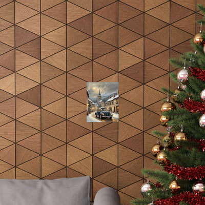 Vintage winter car poster displayed on a geometric wooden wall with a Christmas tree nearby